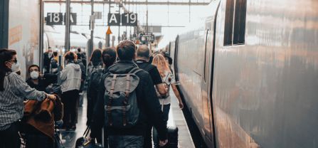 People on a platform at a train station